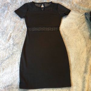 Black dress with lace openings